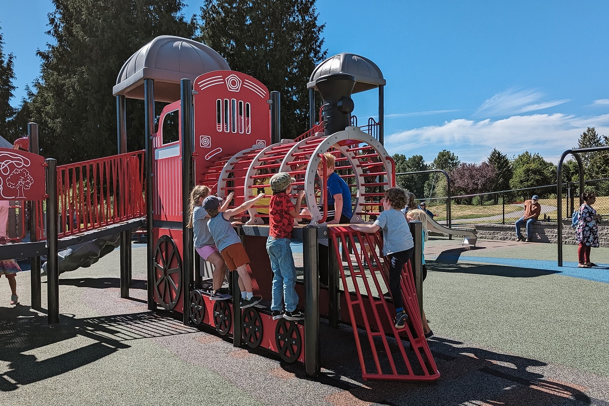 The train-shaped play climber at the new inclusive playground at Mountlake Terrace's Ballinger Park, among fun things to do with kids in Seattle