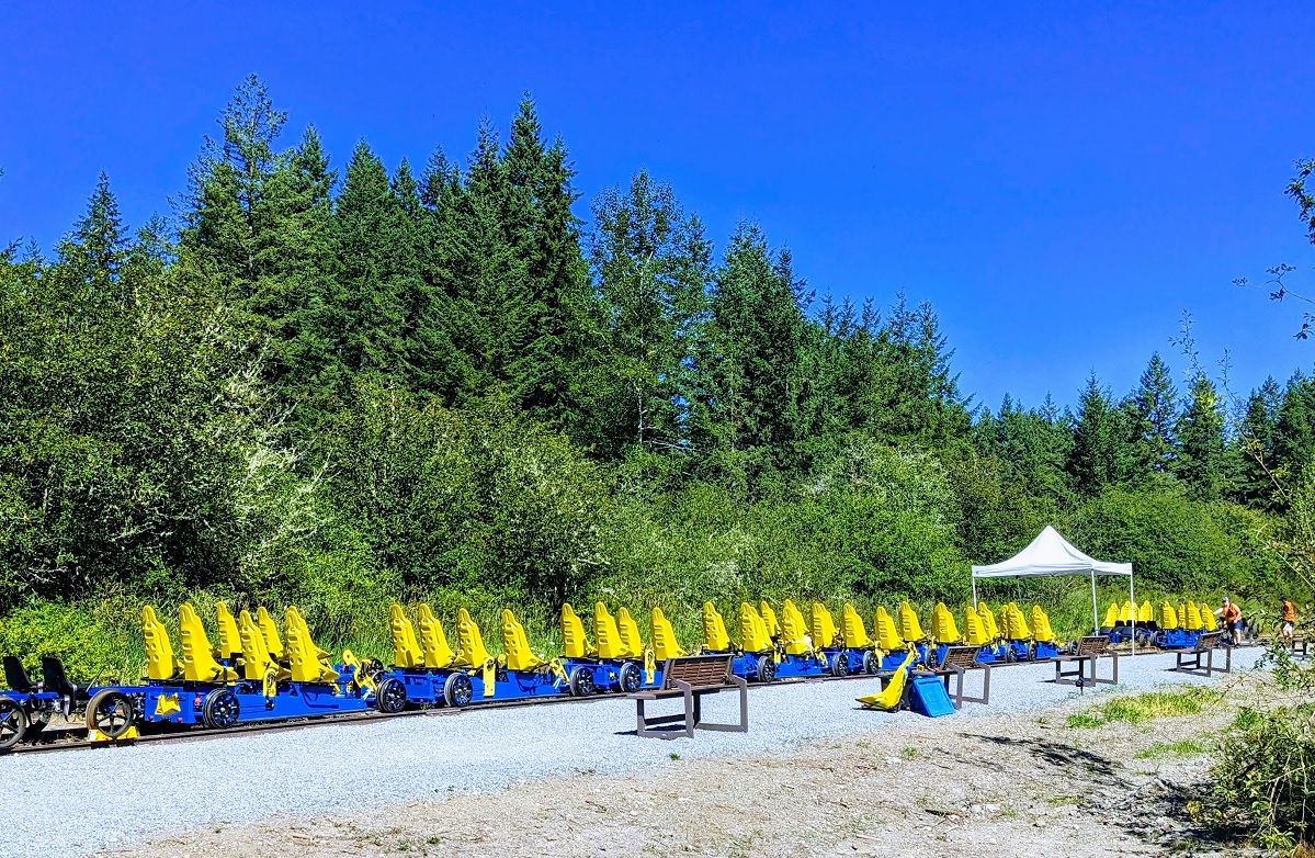 A row of rail bikes awaits riders at RailCycle Mt. Rainier near Seattle
