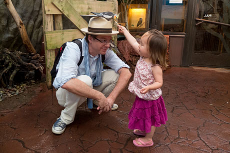 Seattle dad Stuart Isett with his daughter at the zoo. 