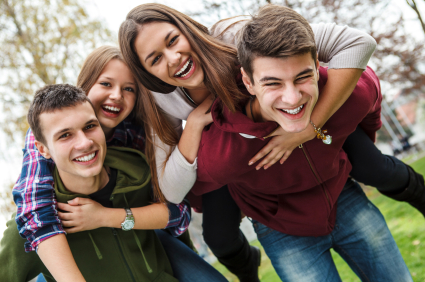 Teens laughing with friends