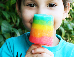 Rainbow pudding popsicles by Sandy Toes and Popsicles