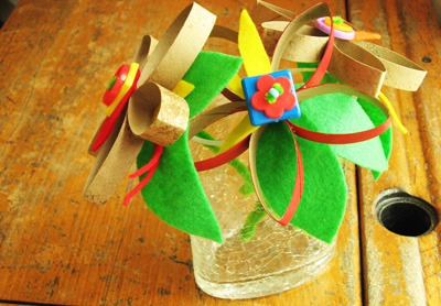 Cardboard flowers with buttons and felt by Plum Pudding