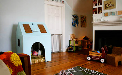 Homemade cardboard playhouse by Make Baby Stuff