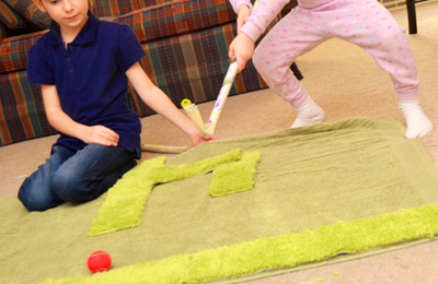 Indoor carpet golf for kids by Inner Child Fun