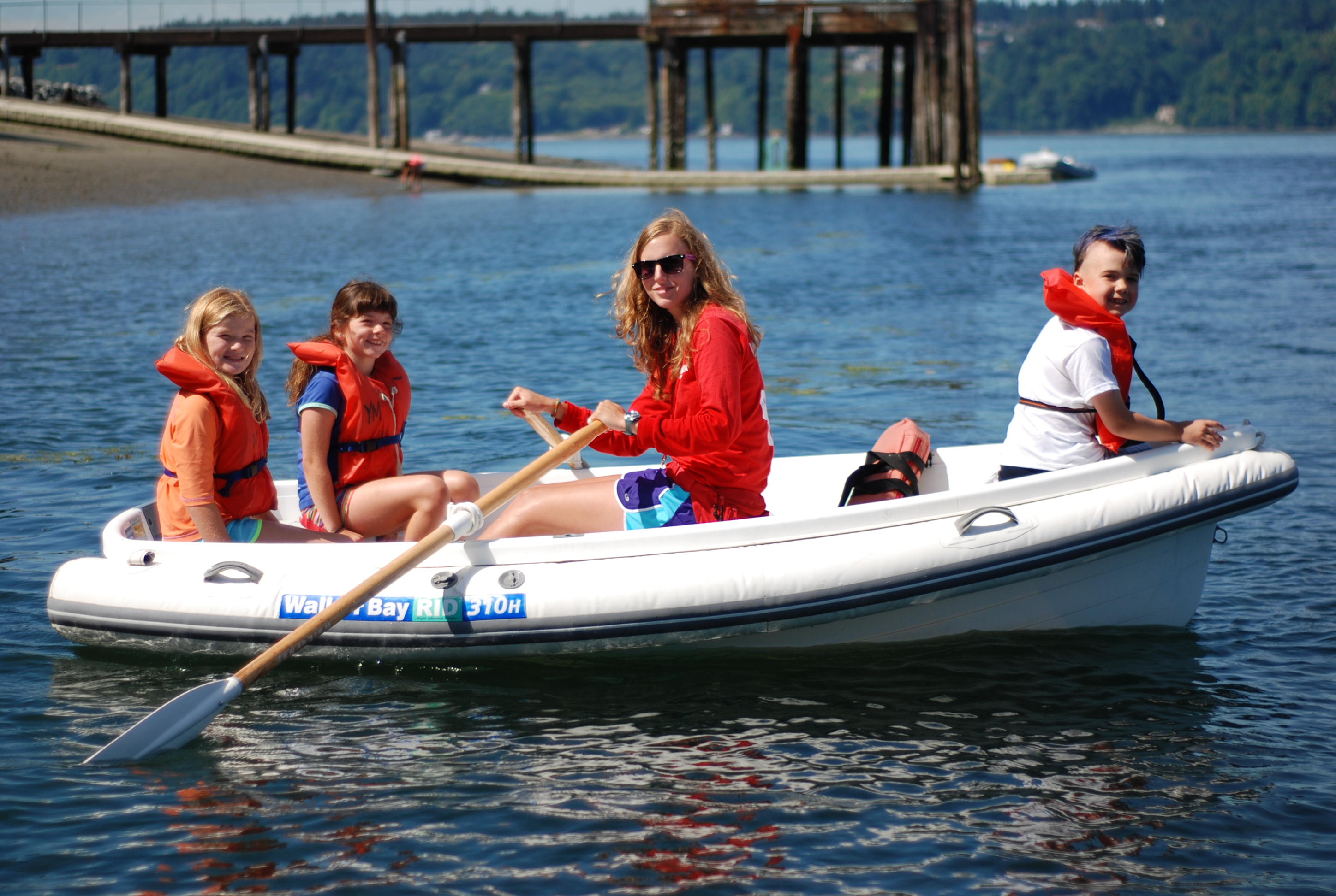 Campers in boat at Camp Sealth