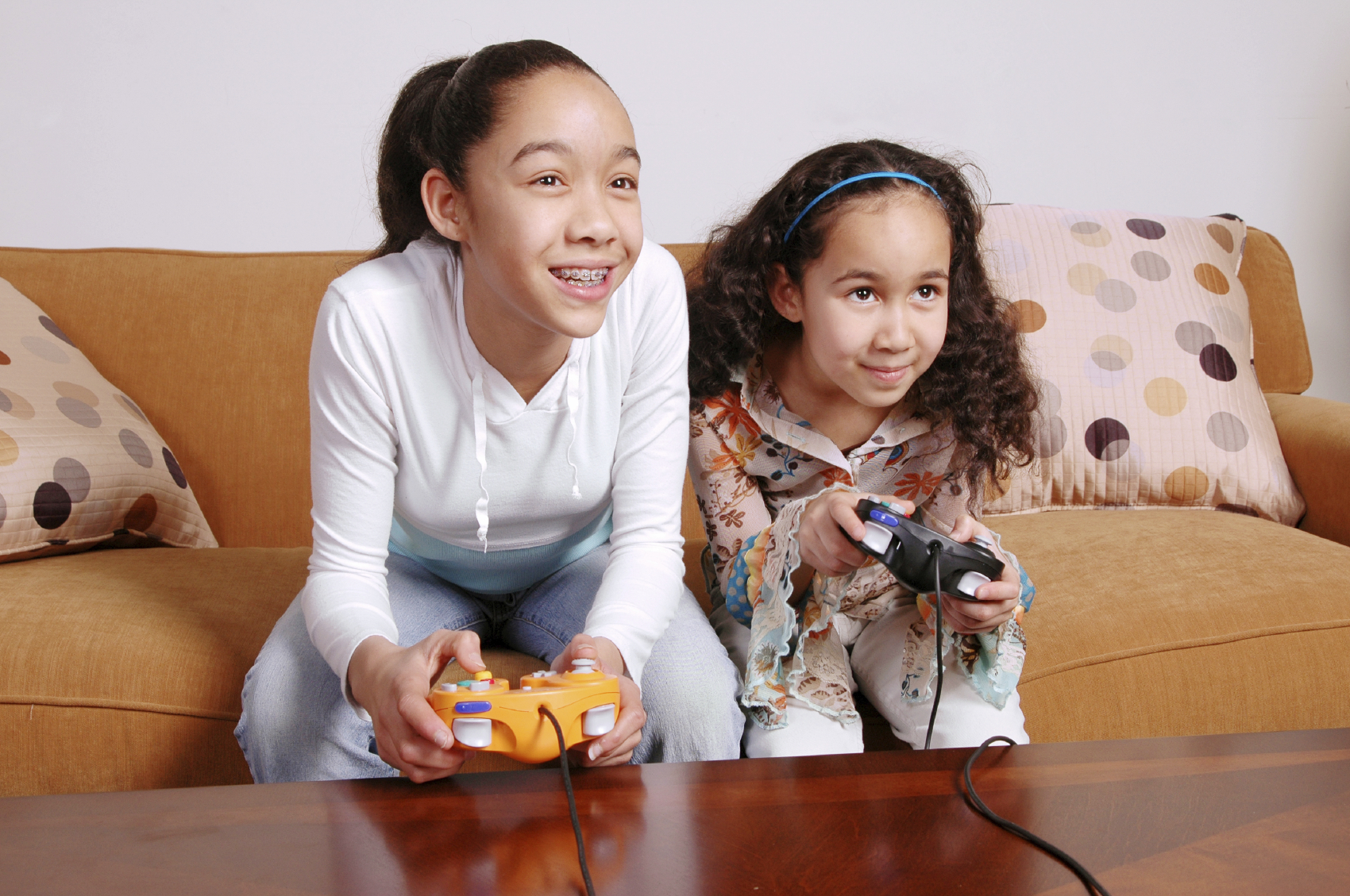 sisters playing video game
