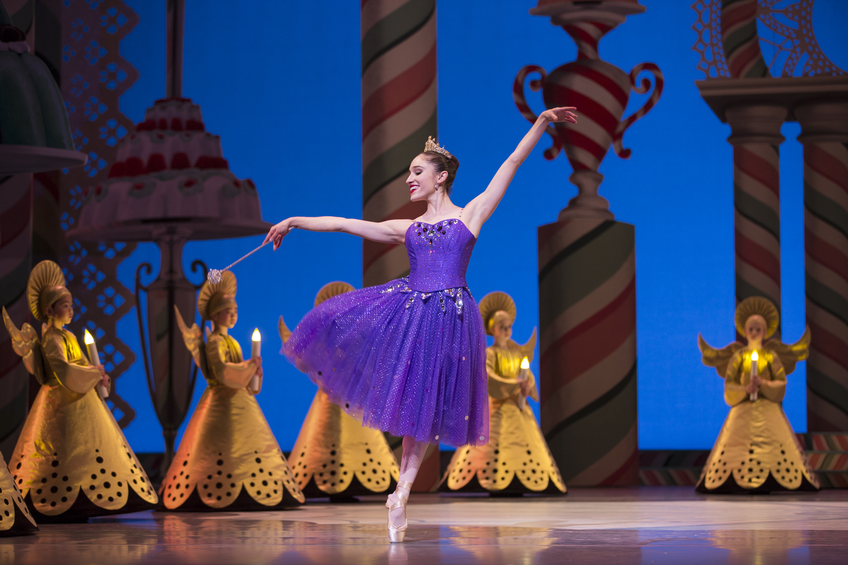 Pacific Northwest Ballet soloist Leta Biasucci as the Sugar Plum Fairy, with PNB School students in George Balanchine’s The Nutcracker®, choreographed by George Balanchine © The George Balanchine Trust. PNB’s production features sets and costumes designed by children’s author and illustrator Ian Falconer (Olivia the Pig) and runs November 25 – December 28, 2016. Photo © Angela Sterling.