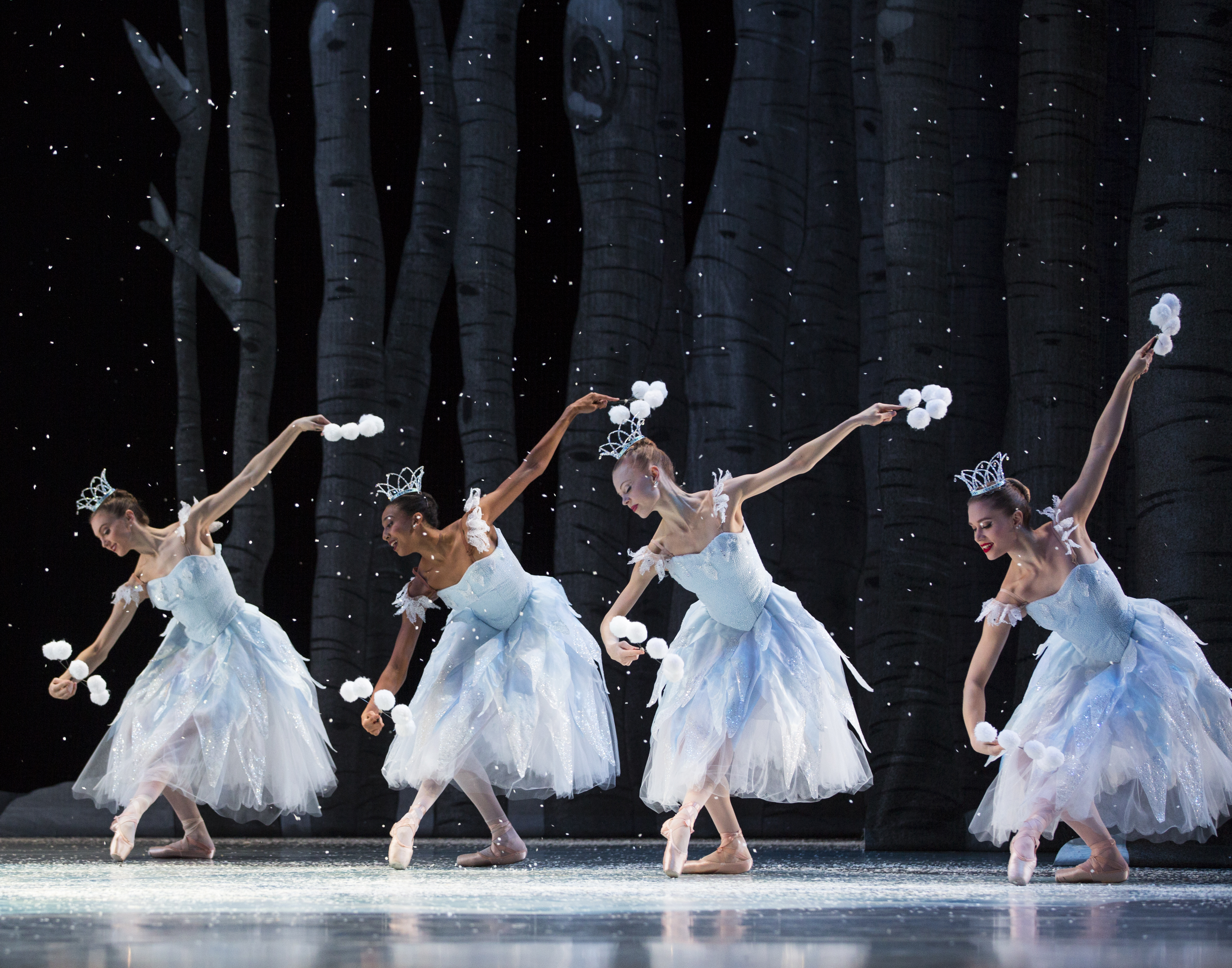 Pacific Northwest Ballet company dancers in the snow scene from George Balanchine’s The Nutcracker®, choreographed by George Balanchine © The George Balanchine Trust. PNB’s production features sets and costumes designed by children’s author and illustrator Ian Falconer (Olivia the Pig) and runs November 25 – December 28, 2016. Photo © Angela Sterling.