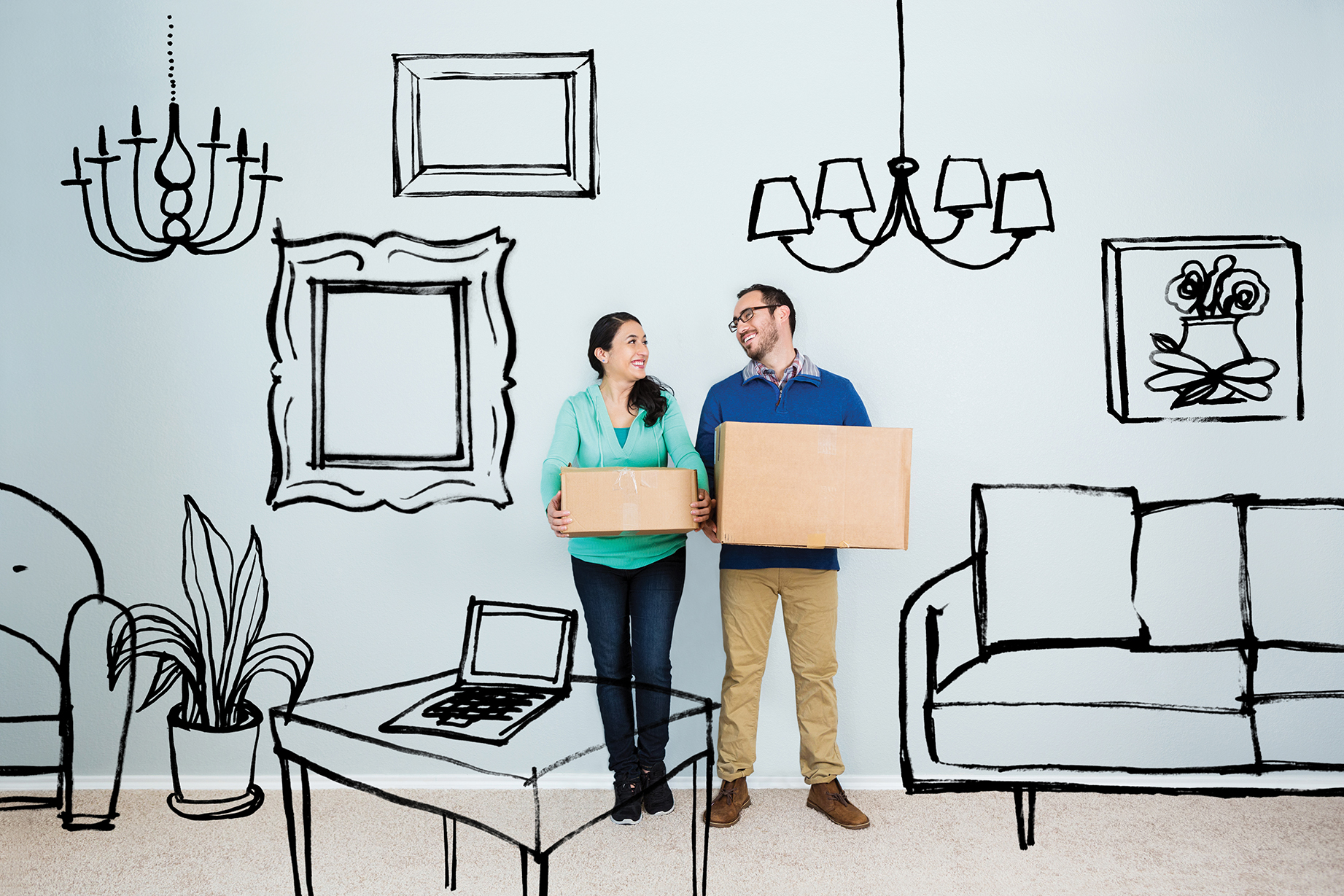 couple with boxes in new home