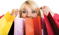 Woman excited over shopping bags