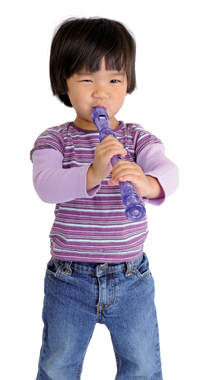 Boy playing recorder