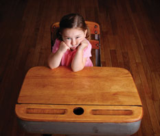 Bored girl at desk