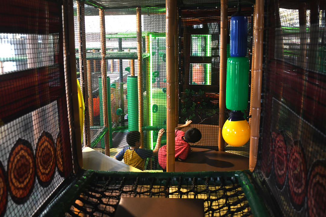 Kids navigate the giant climbing gym at The Ridge Activity Center in Bothell