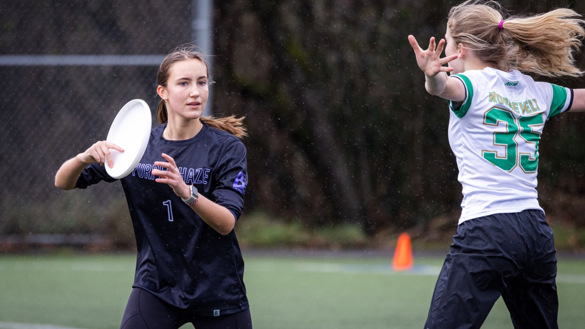 "Seattle Ultimate Frisbee player getting ready to throw the disc"