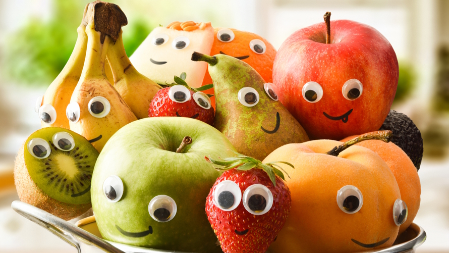 "Bowl of fruit with google eyes"