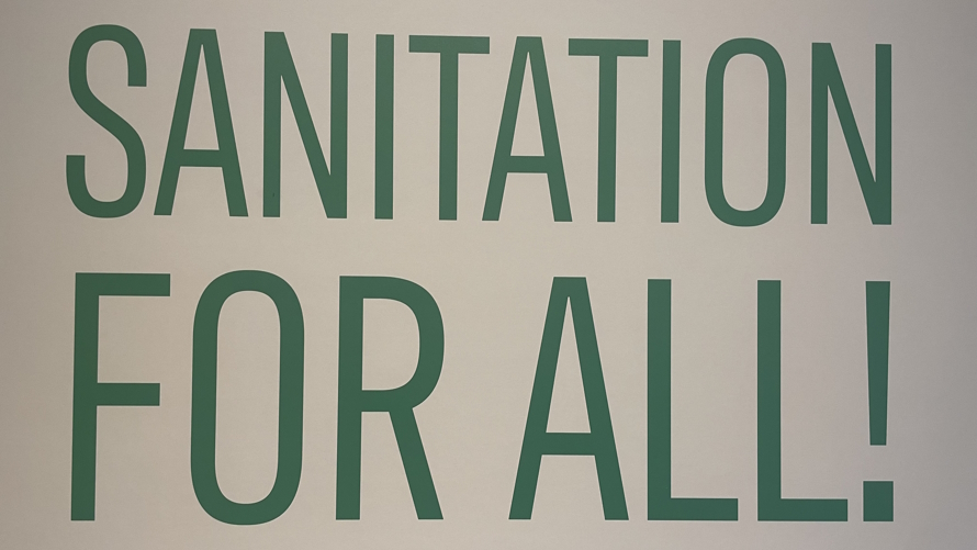 "Sanitation for all sign. Gates Foundation Discovery Center sanitation exhibit"