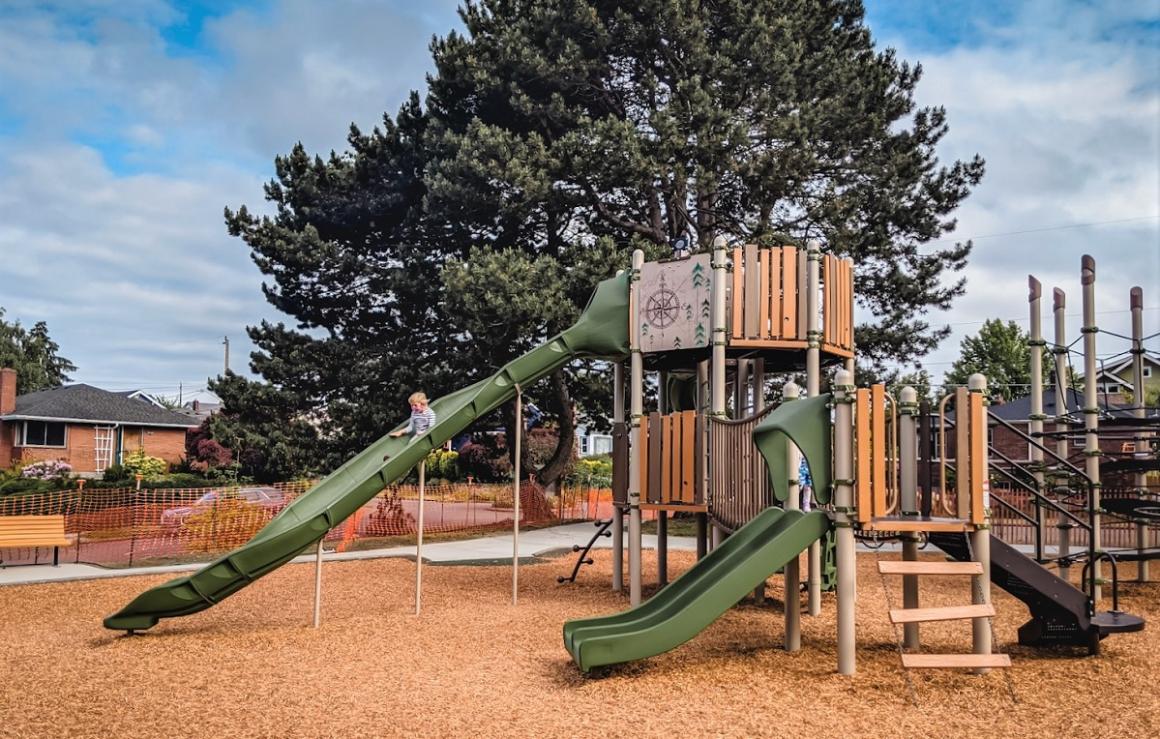 Long green slide at new Loyal Heights Playfield playground opened June 2021