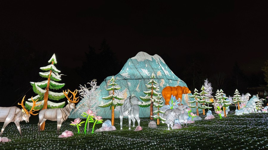 Mount Rainier lantern at Woodland Park Zoo with forest animals in front of it