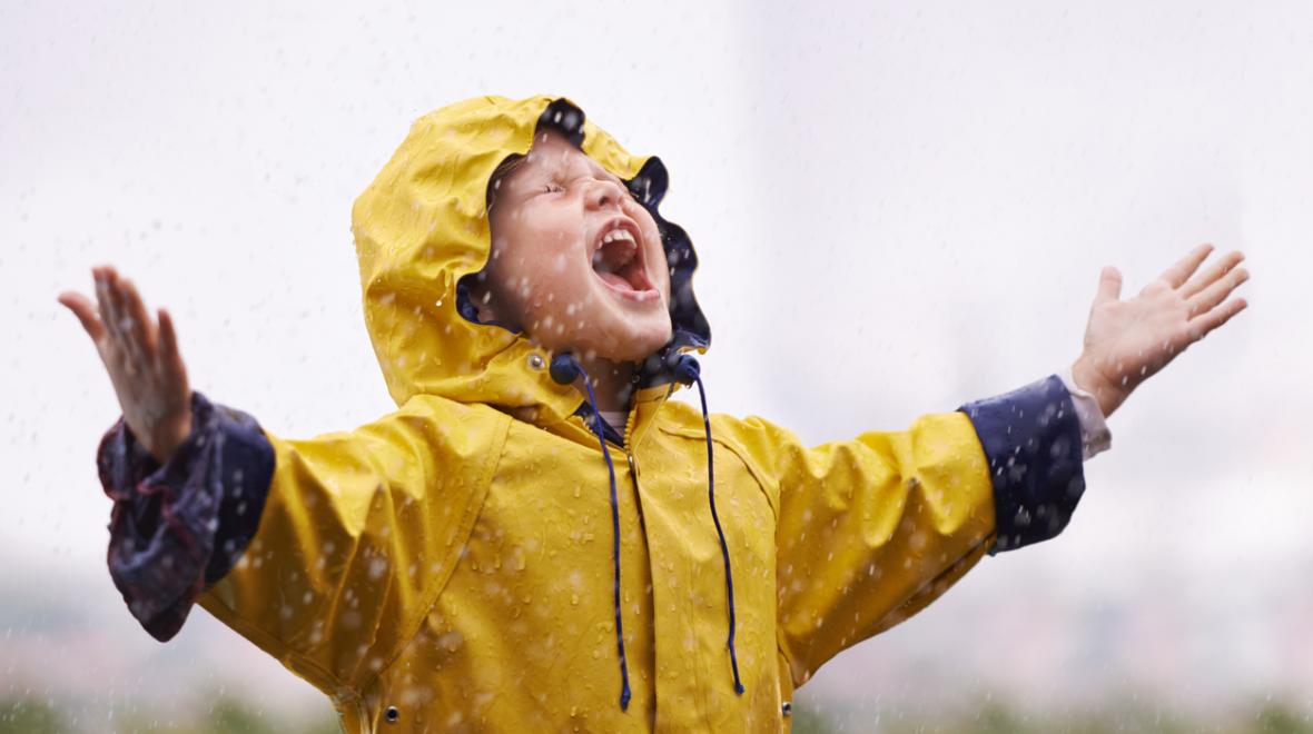child-playing-in-the-rain