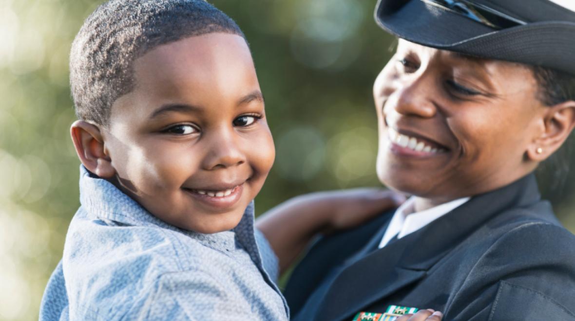 Kid with mom in Navy uniform