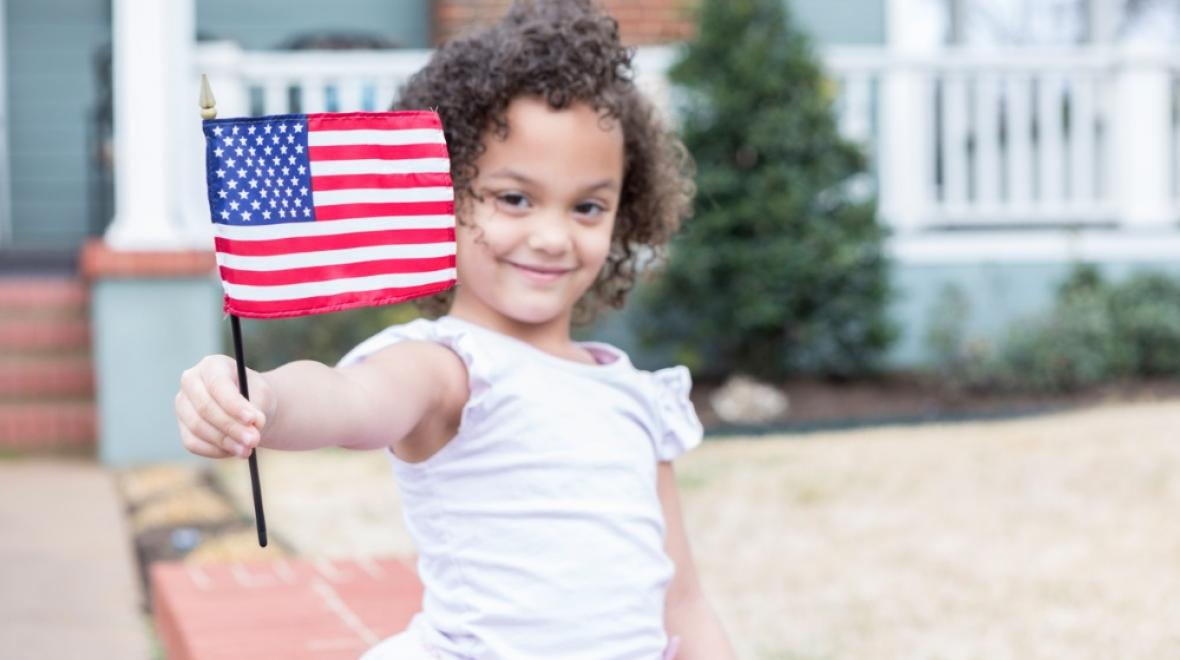 Girl with Memorial Day flag