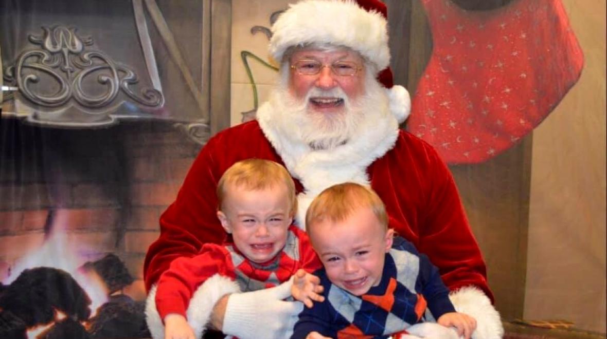 Santa and two boys