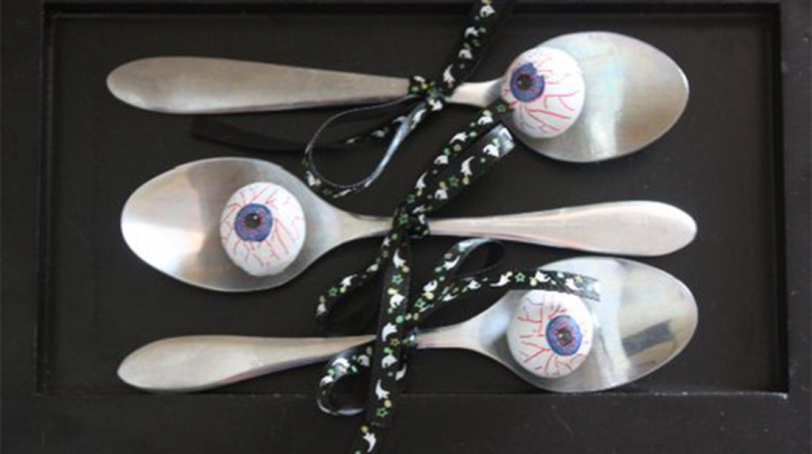 Pretend eyeballs on spoons are part of a Halloween games for kids relay