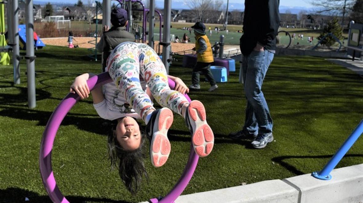 girl-playing-High-Point-play-area-new-playground-seattle-best-new-playgrounds-parks-2019