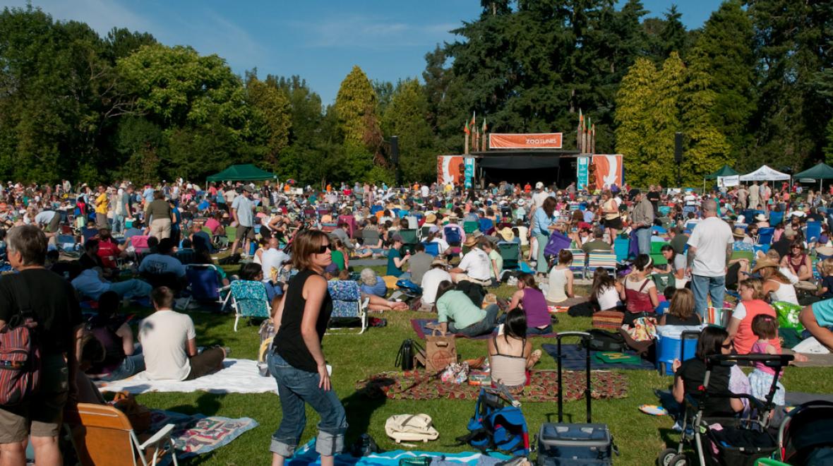 Concert goers enjoy a ZooTunes outdoor concert at Seattle's Woodland Park Zoo in a previous year