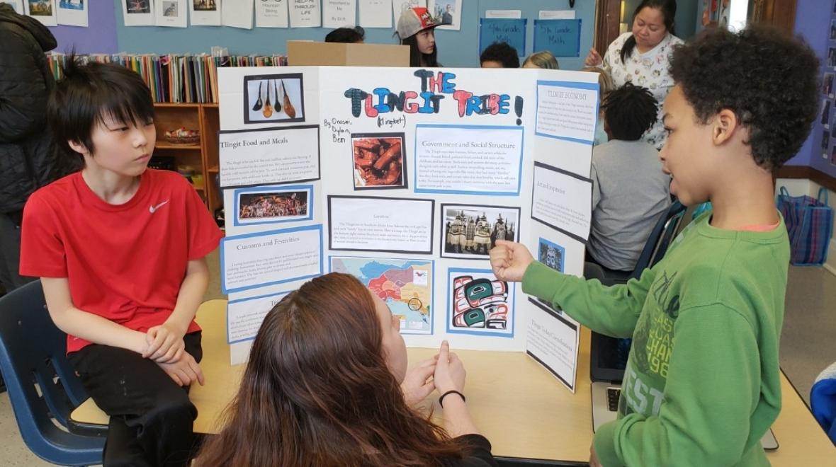 Students at the Giddens School review a lesson on the Tlingit Tribe of Alaska.