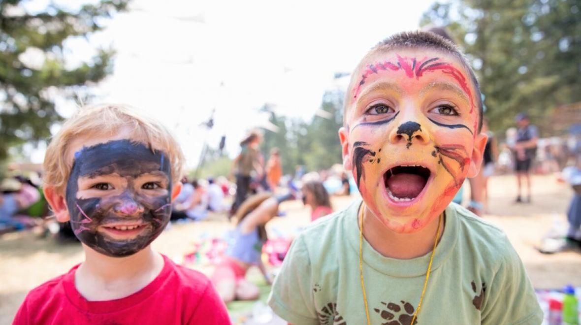 Kids at Pickathon with face paint, smiling during a Seattle music festival
