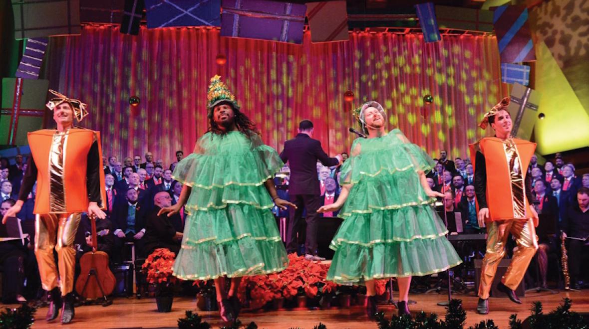 Men dressed at Christmas trees. Seattle Men’s Chorus performing “A TREEmendous Holiday”