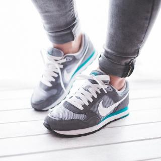Woman's feet in running shoes