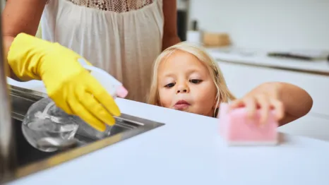 kid-using-cleaning-products