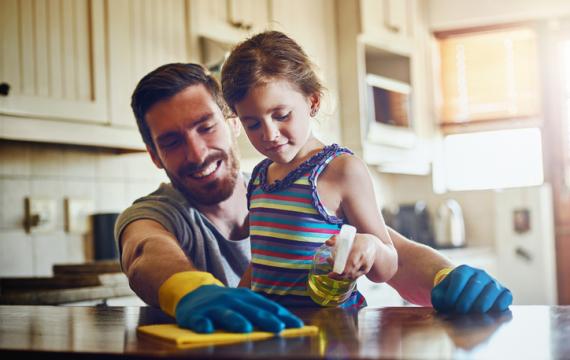 Father and daughter doing chores