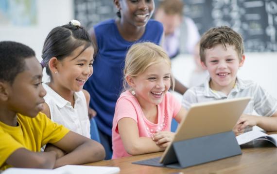 kids watching a tablet