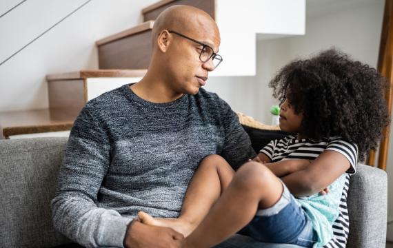Dad talking with daughter effective ways to deal with bad behavior