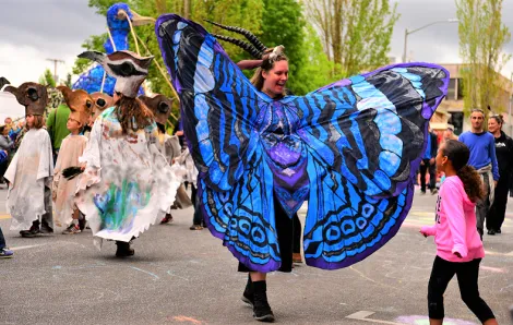 Butterfly costumed participant in the Procession of the Species