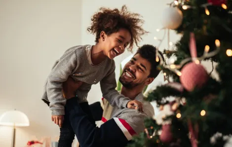 Kid laughing at Christmas