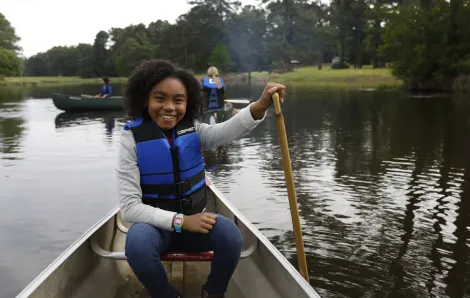 Young Seattle Scouts BSA participant enjoying canoeing