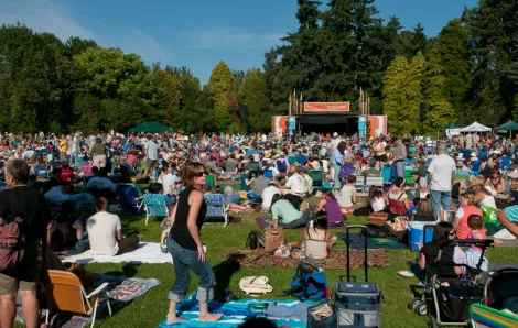 Concert goers enjoy a ZooTunes outdoor concert at Seattle's Woodland Park Zoo in a previous year