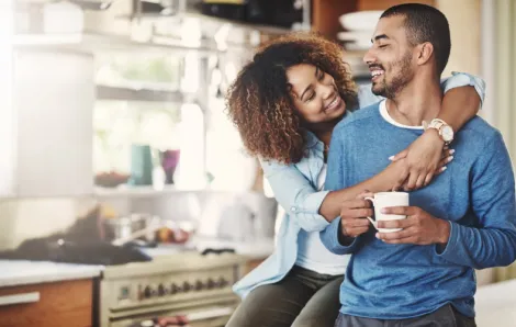 Couple-having-coffee-together-at-home