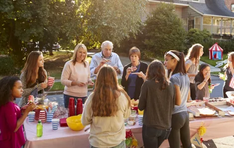 Group of people eating at a block party