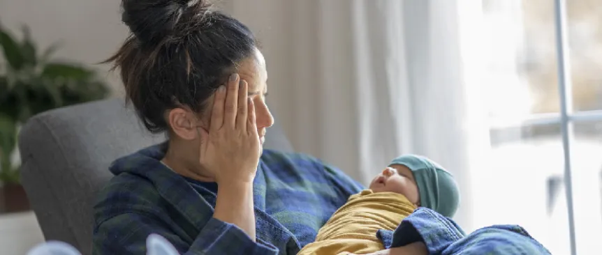 Tired-mom-with-newborn-baby