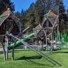 Climbing structures at Bridle Valley Creek Trails Park playground in Bellevue
