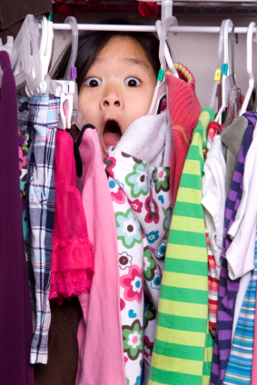 Kid surprised by choices in closet