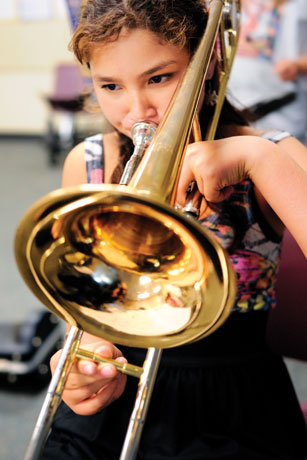 Girl playing trombone