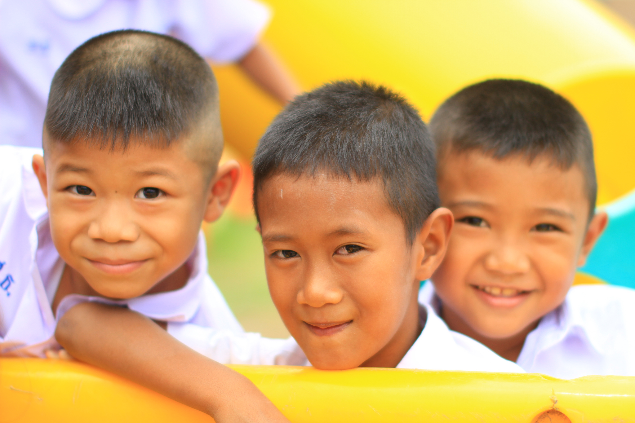 happy thai boys on playground