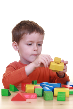 Boy playing blocks