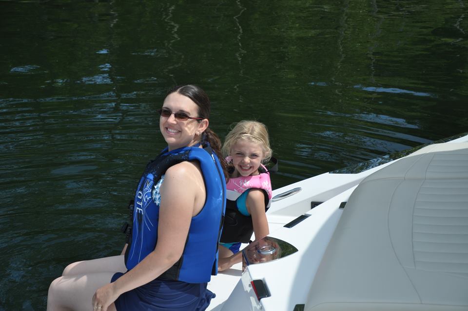 Boating mom and daughter